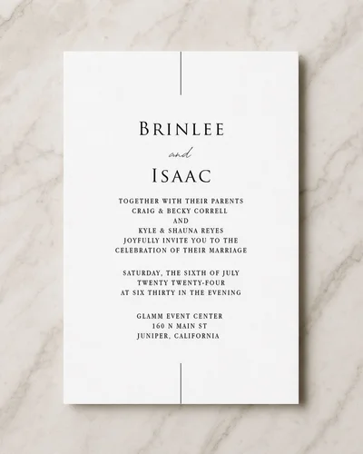 Rustic boho wedding invitation with dried flowers and gold calligraphy